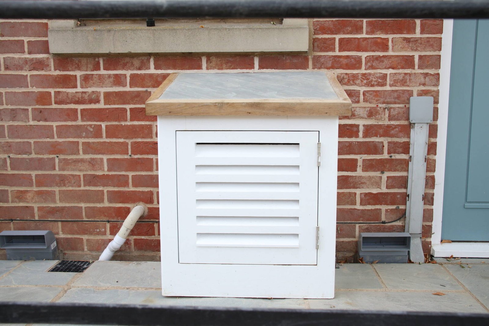 Bespoke louvred timber cover